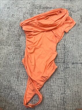 Astr One-Shoulder Bodysuit in Coral Orange